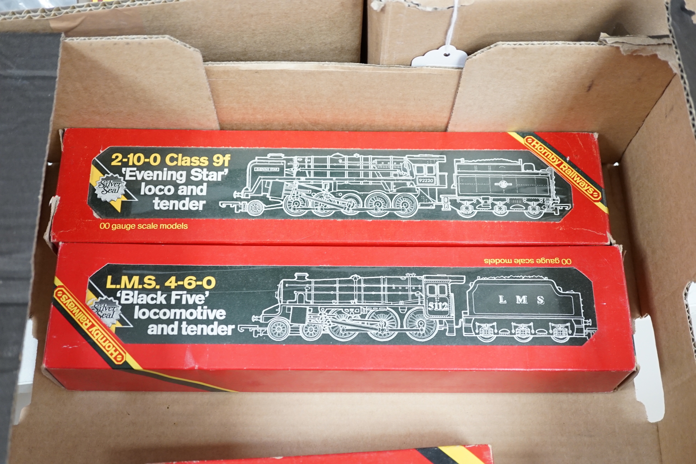 Five boxed Hornby Railways 00 gauge locomotives including; an LMS Black Five (R840), an LMS Class Five (R842), a BR Class 9F (R065), an LNER Class A3 (R 855), and a BR Class 3F (R058)